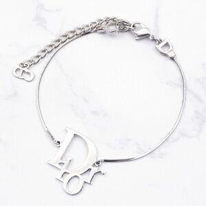Vintage Christian Dior Classic Logo Monogram Letter Silver Snakebone Bracelet